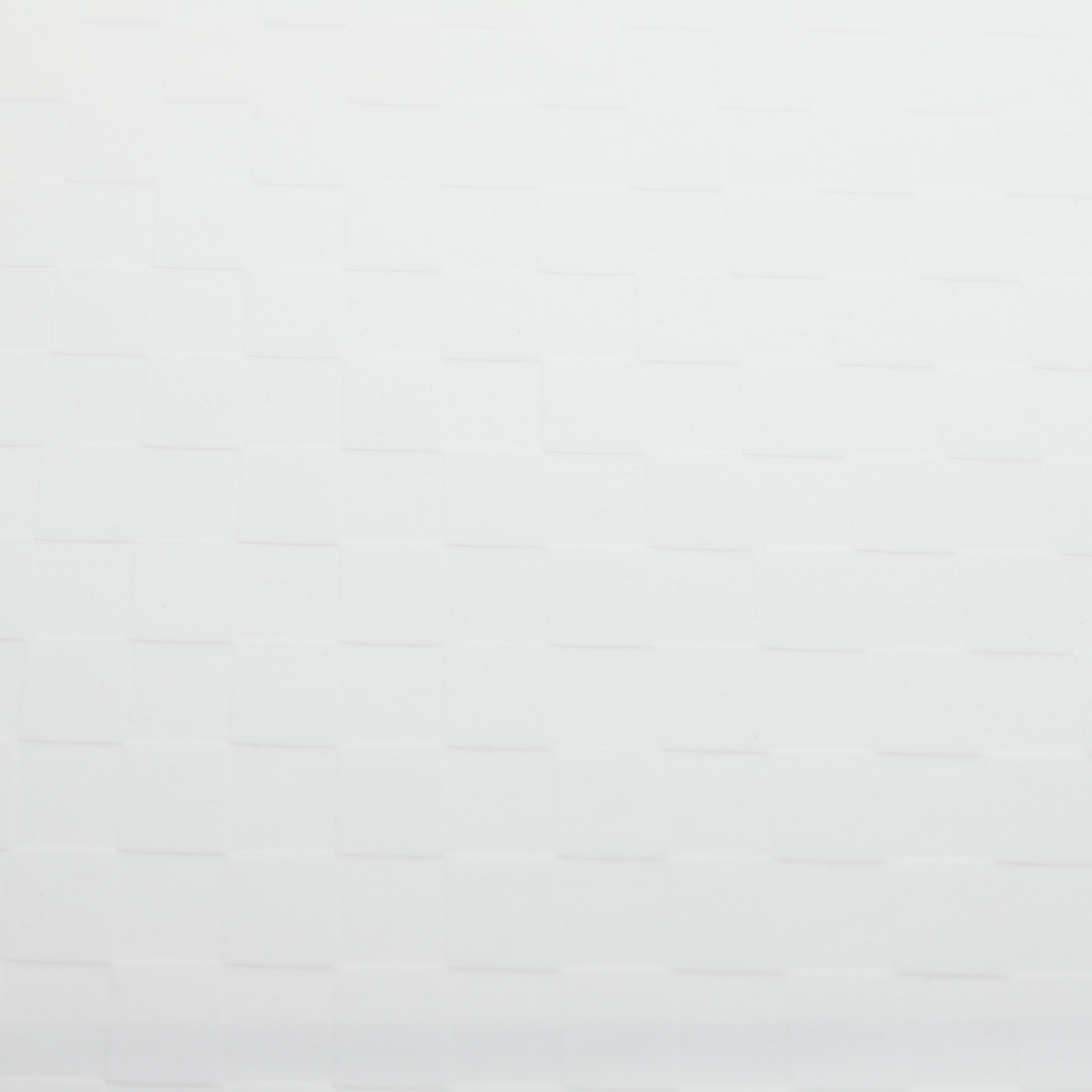 Tissu jacquard uni blanc texturé à petits carreaux