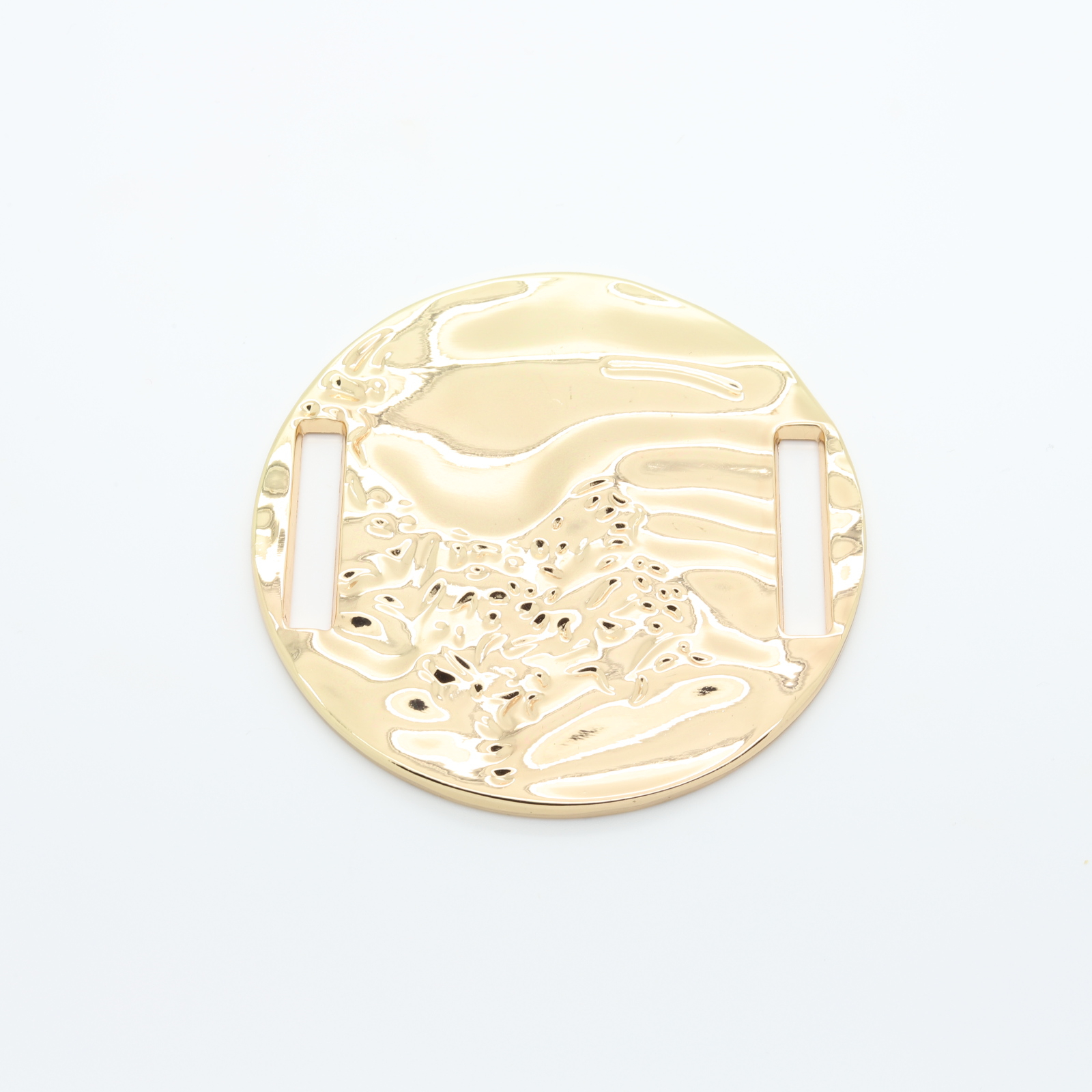 Large round gilded metal loop with relief structure