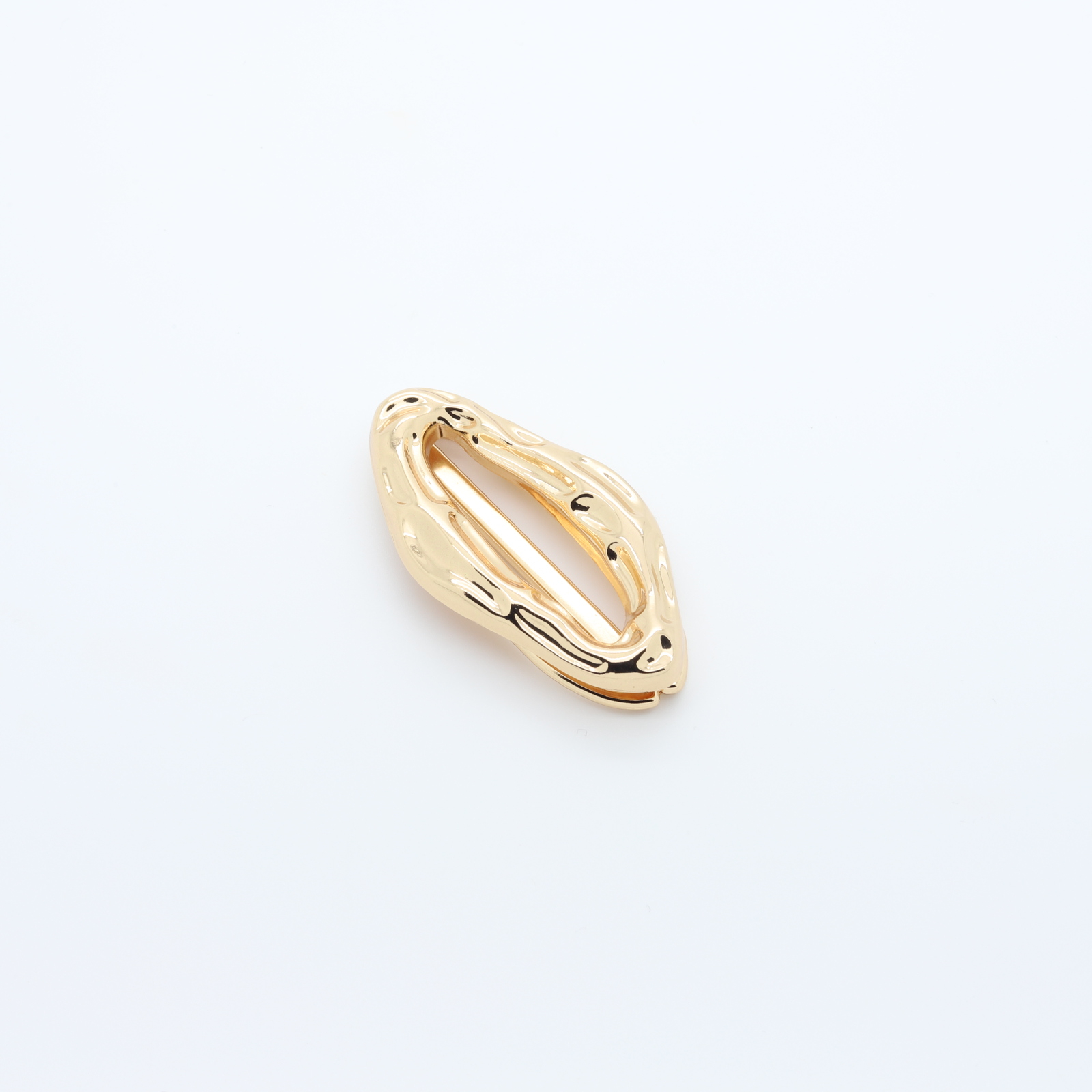 Small oval-shaped loop in gilded metal