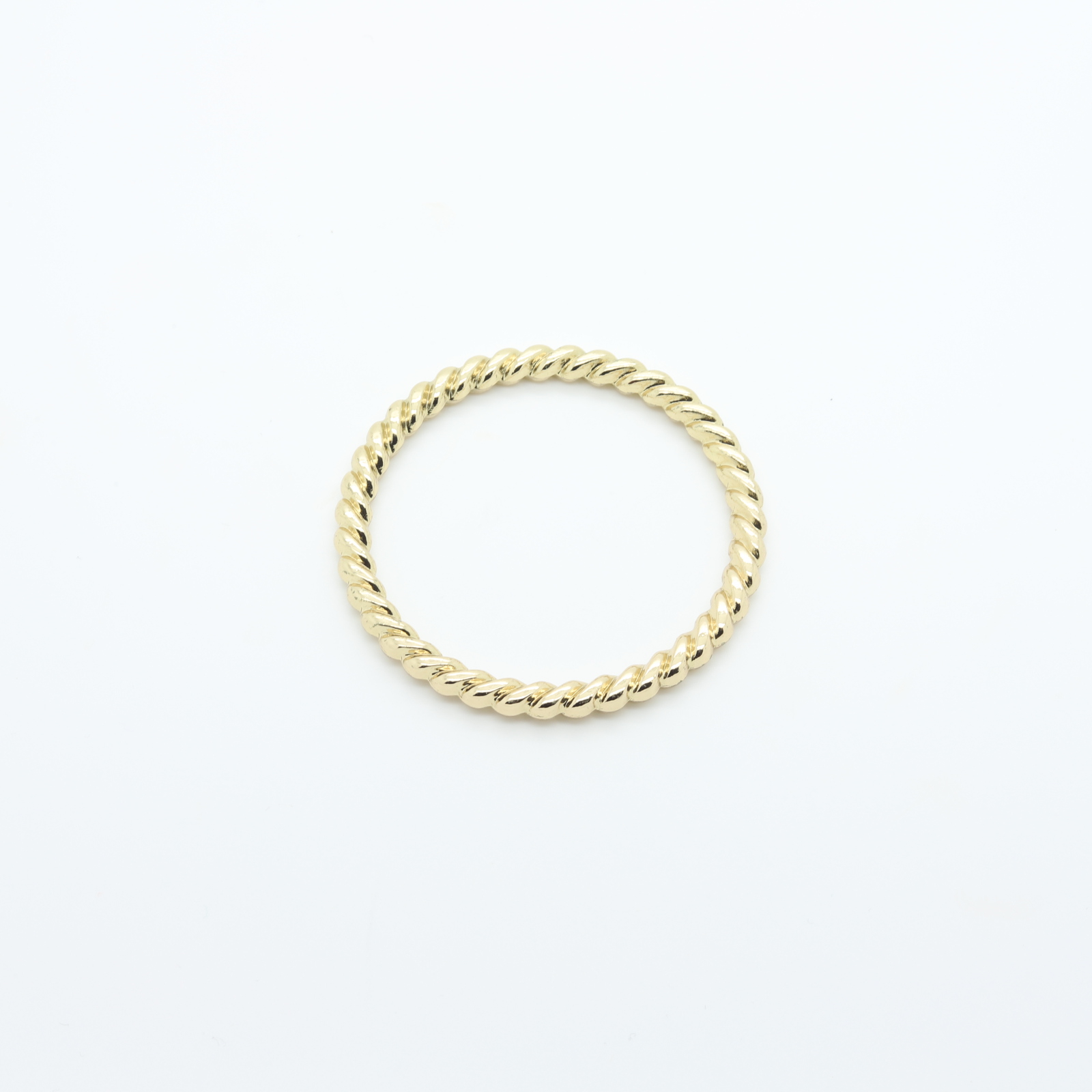 Large gold-plated twisted connector ring
