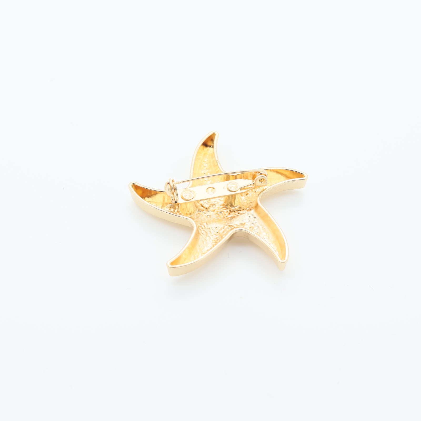 Broche en forme d'étoile de mer