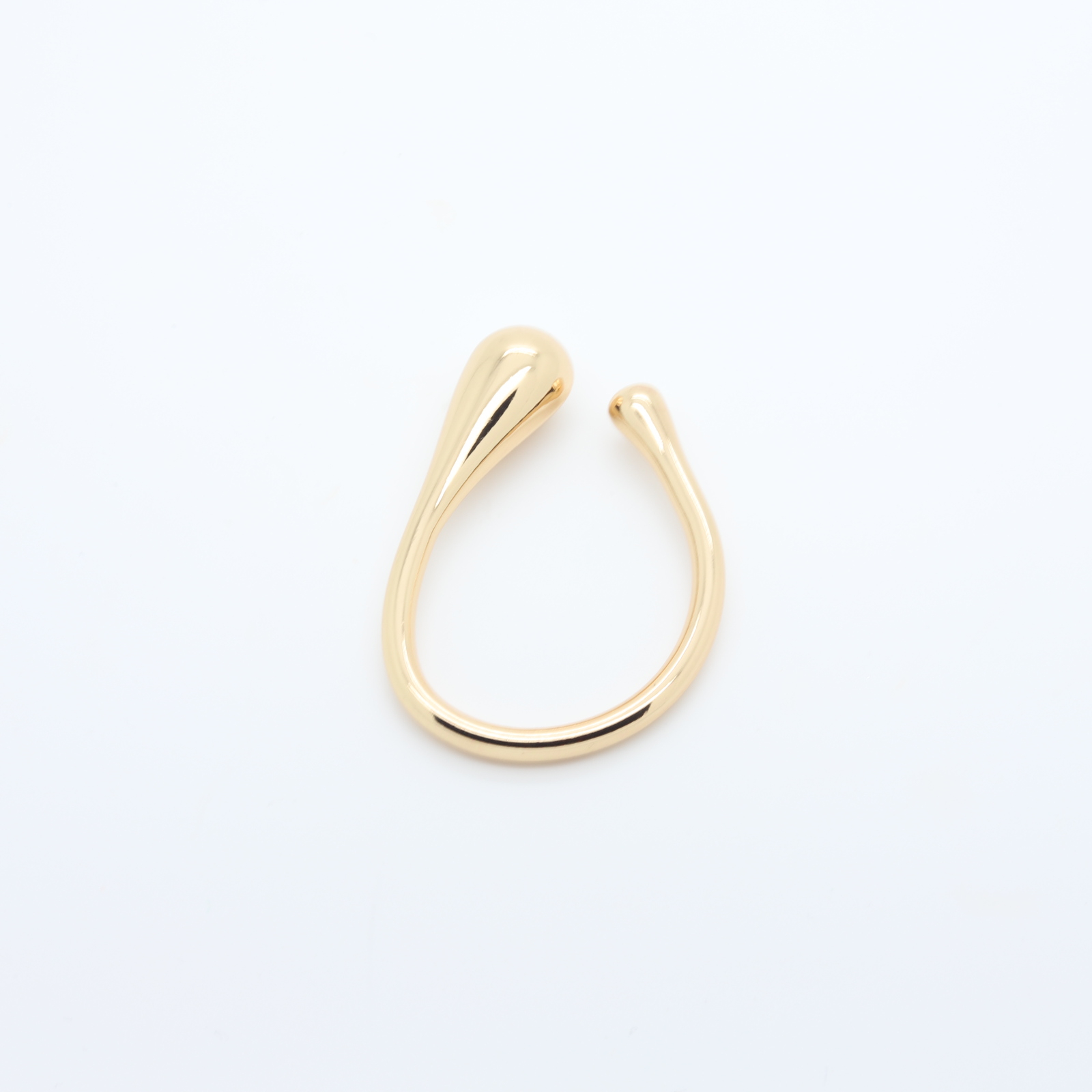 Separador de metal dourado em forma de U