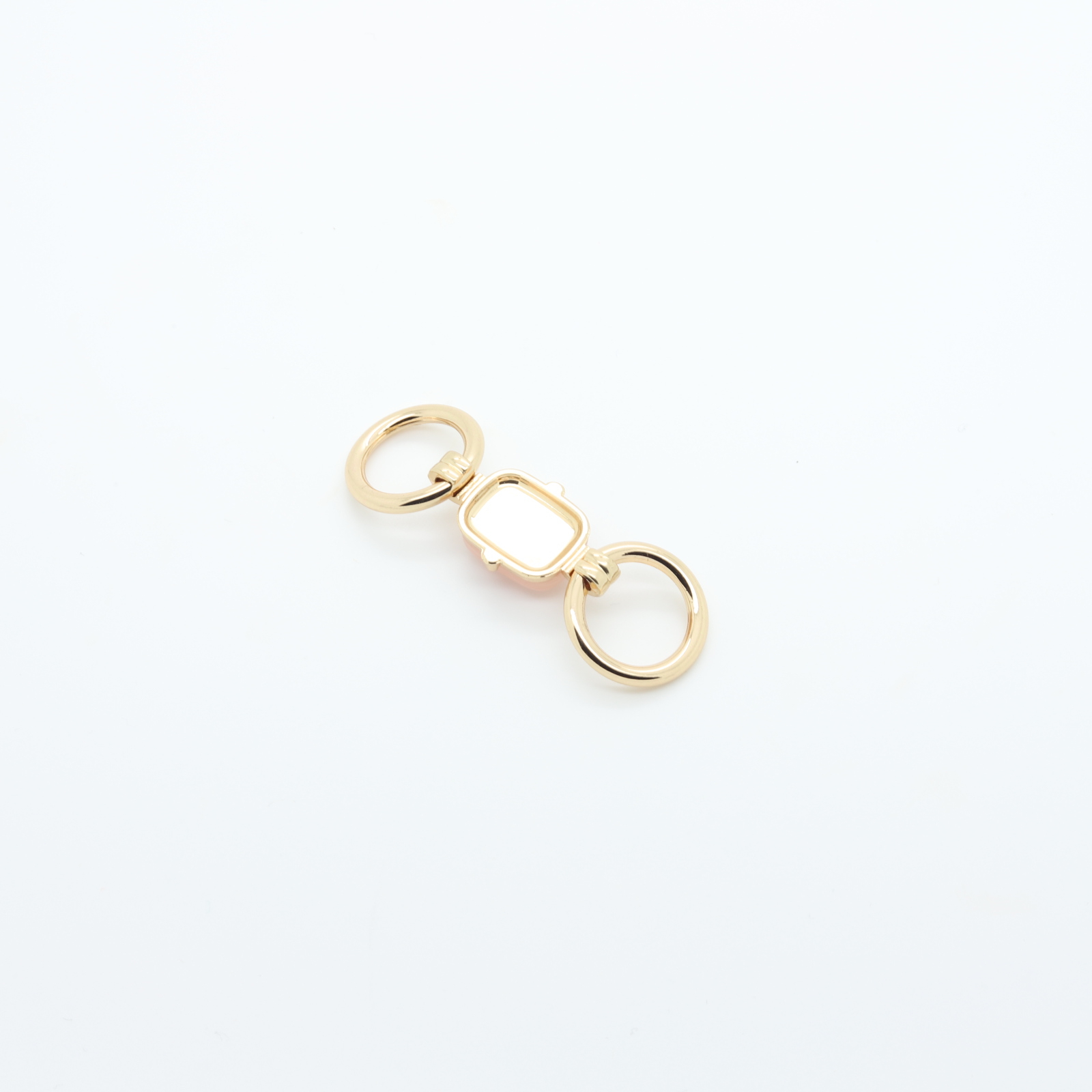Conector em metal dourado com duas argolas - Pedra rosa natural no centro