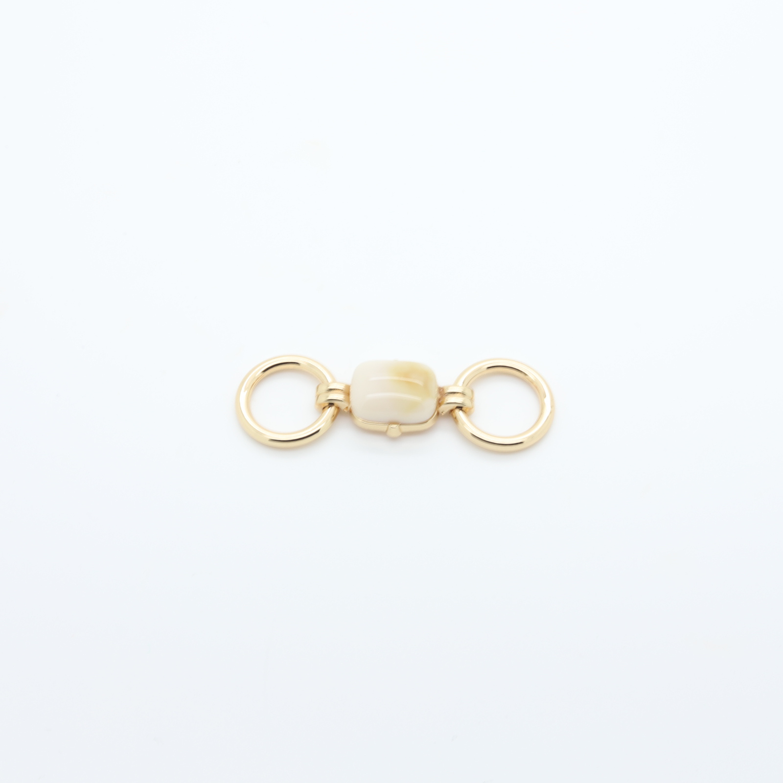 | Gold-plated metal connector with two loops - White natural stone in the center | D'YRSAN