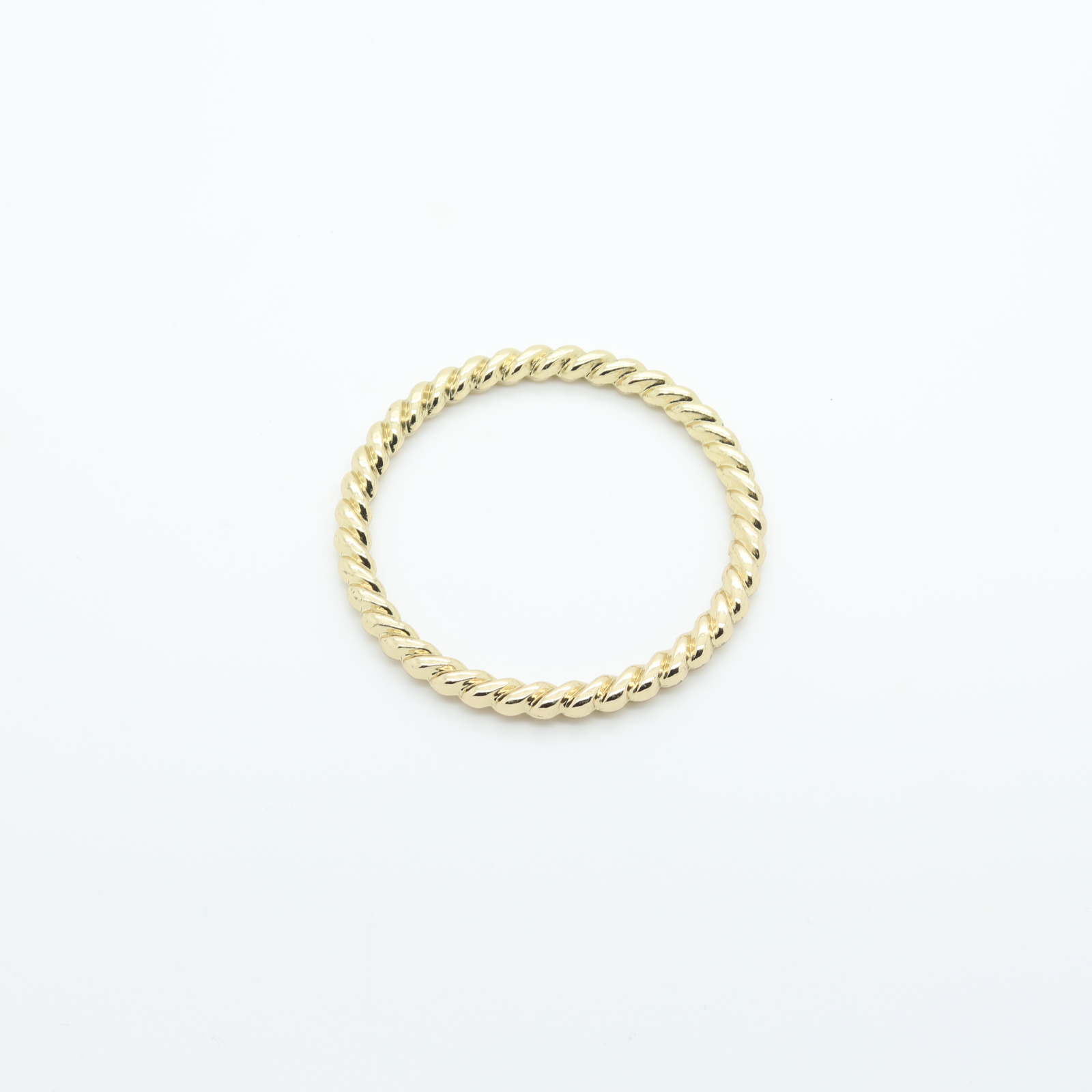 Large gold-plated twisted connector ring