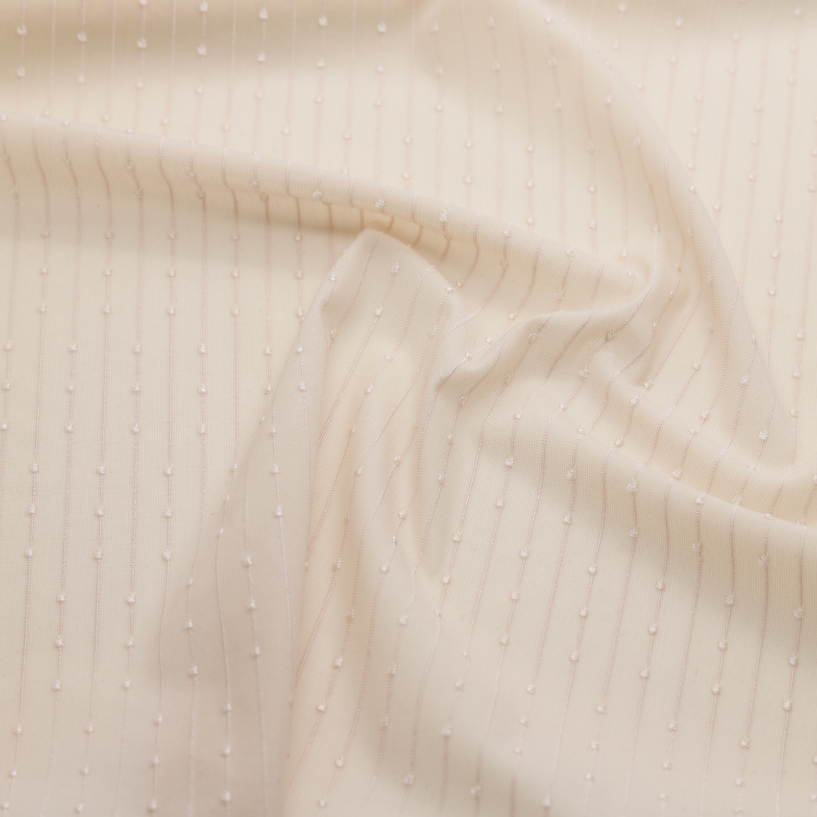 | Tessuto jacquard trasparente a righe color pelle | D'YRSAN