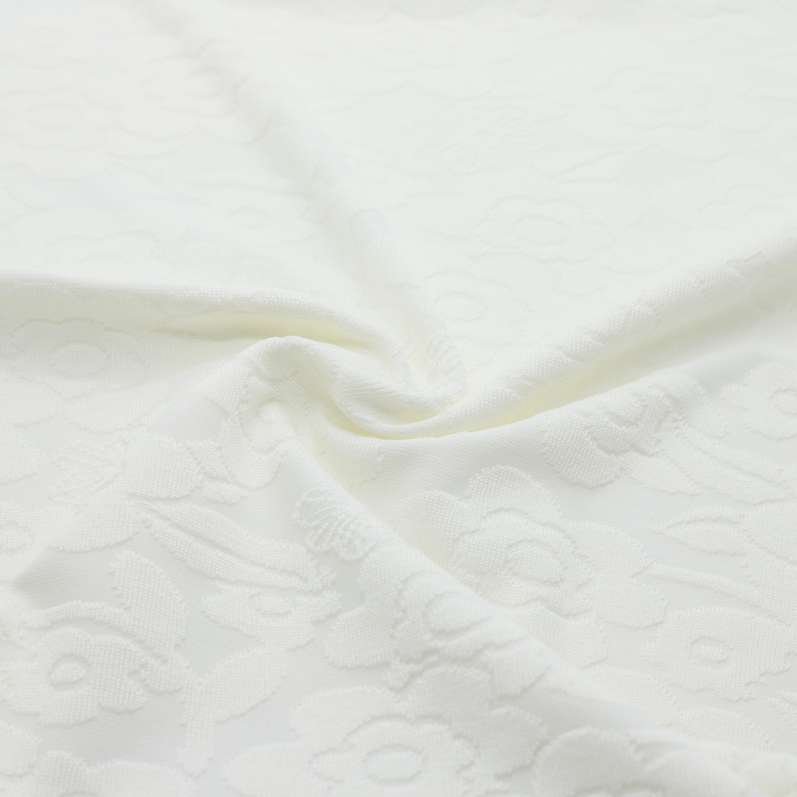| Tessuto jacquard testurizzato con motivi floreali | D'YRSAN