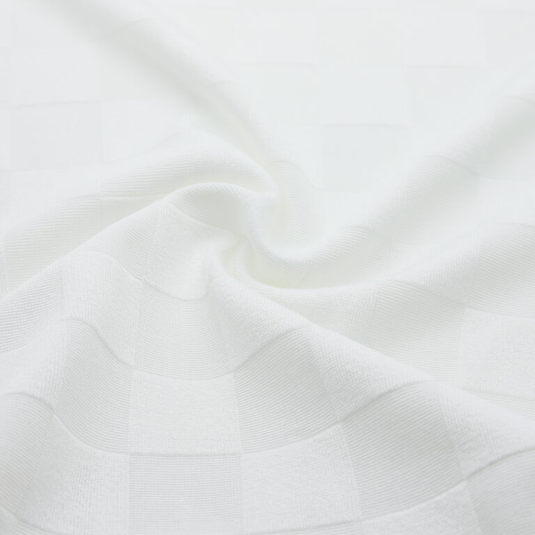 Tissu en jacquard texturé motifs carreaux blanc
