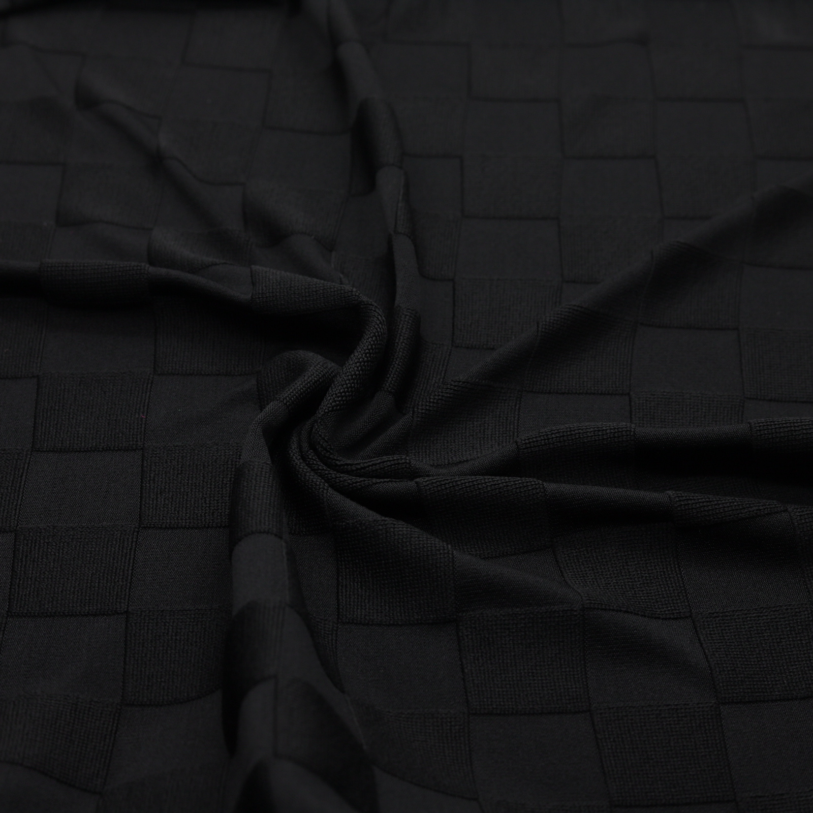 | Tessuto jacquard tinta unita nero a piccoli quadri | D'YRSAN