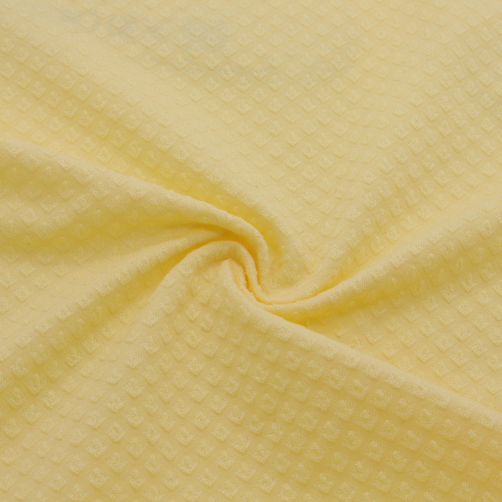 Textured yellow jacquard fabric