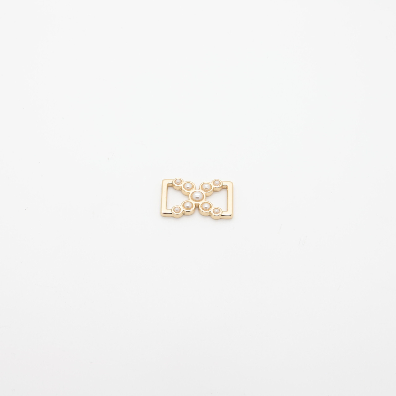 Gold-plated metal connector adorned with pearls