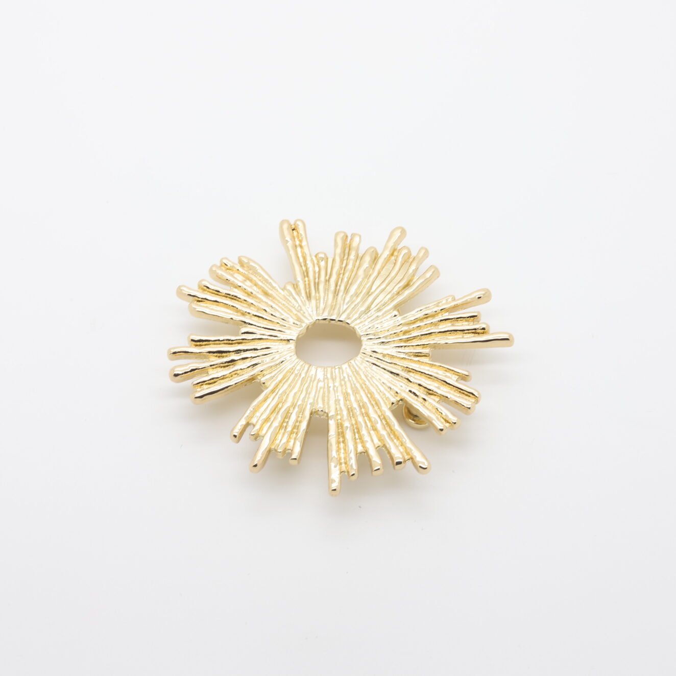 Sun-shaped decorative grommet