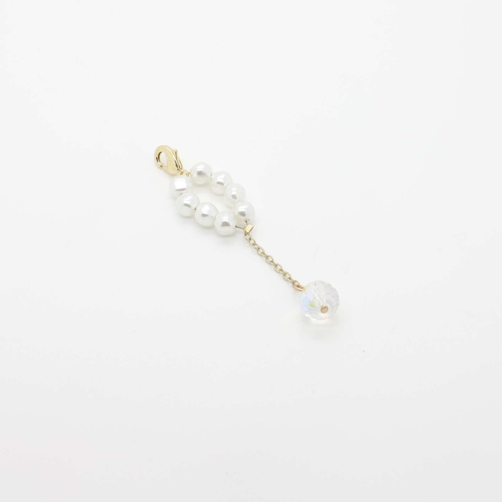 Colgante de perlas y cristal en metal dorado