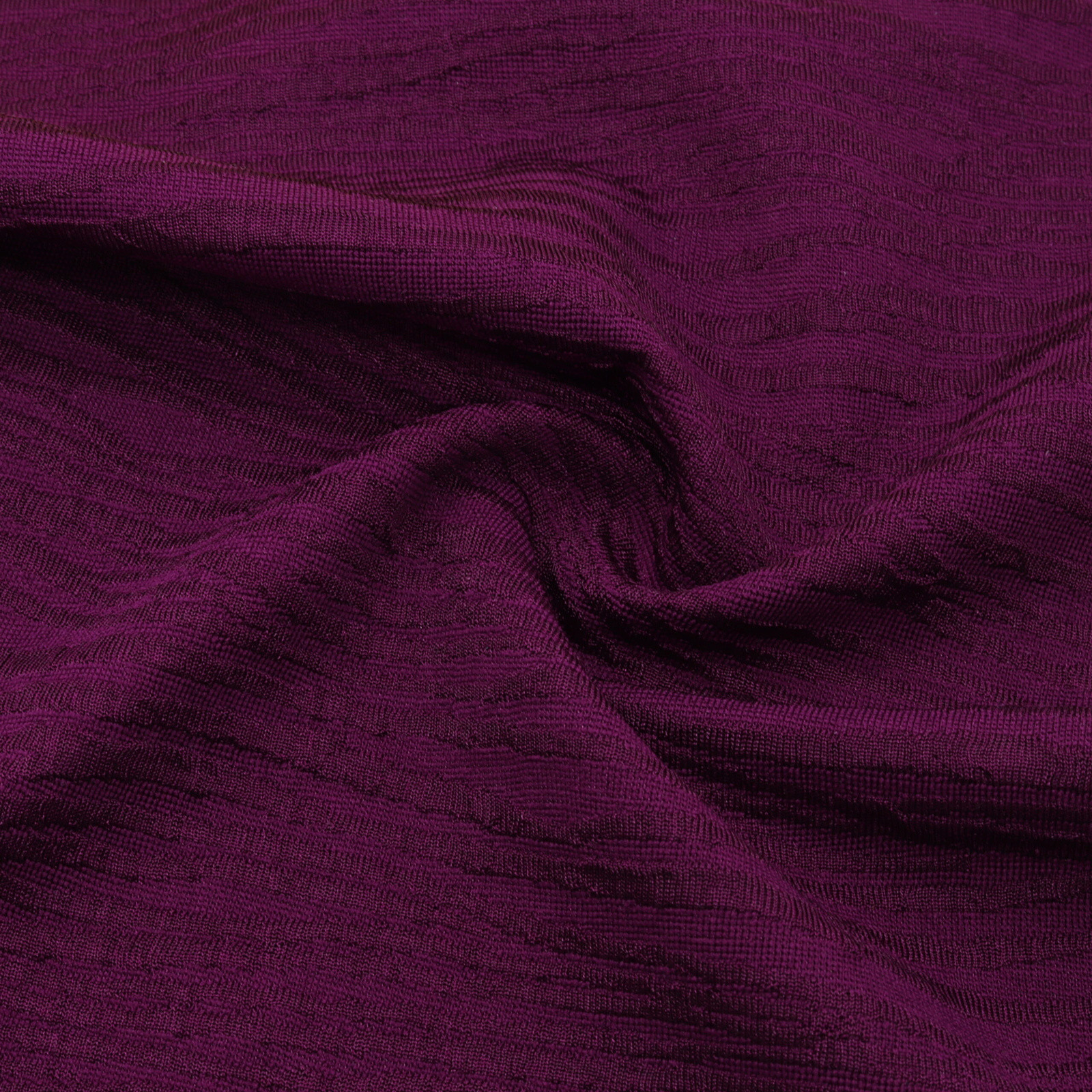 Purple polyester elastane embossed bathing fabric