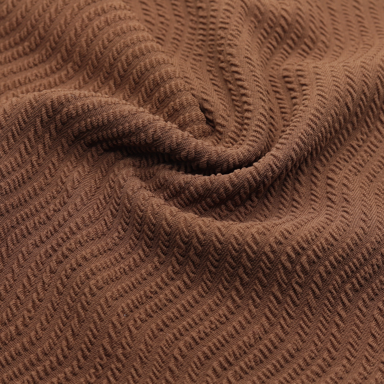Tecido de malha jacquard com textura espessa