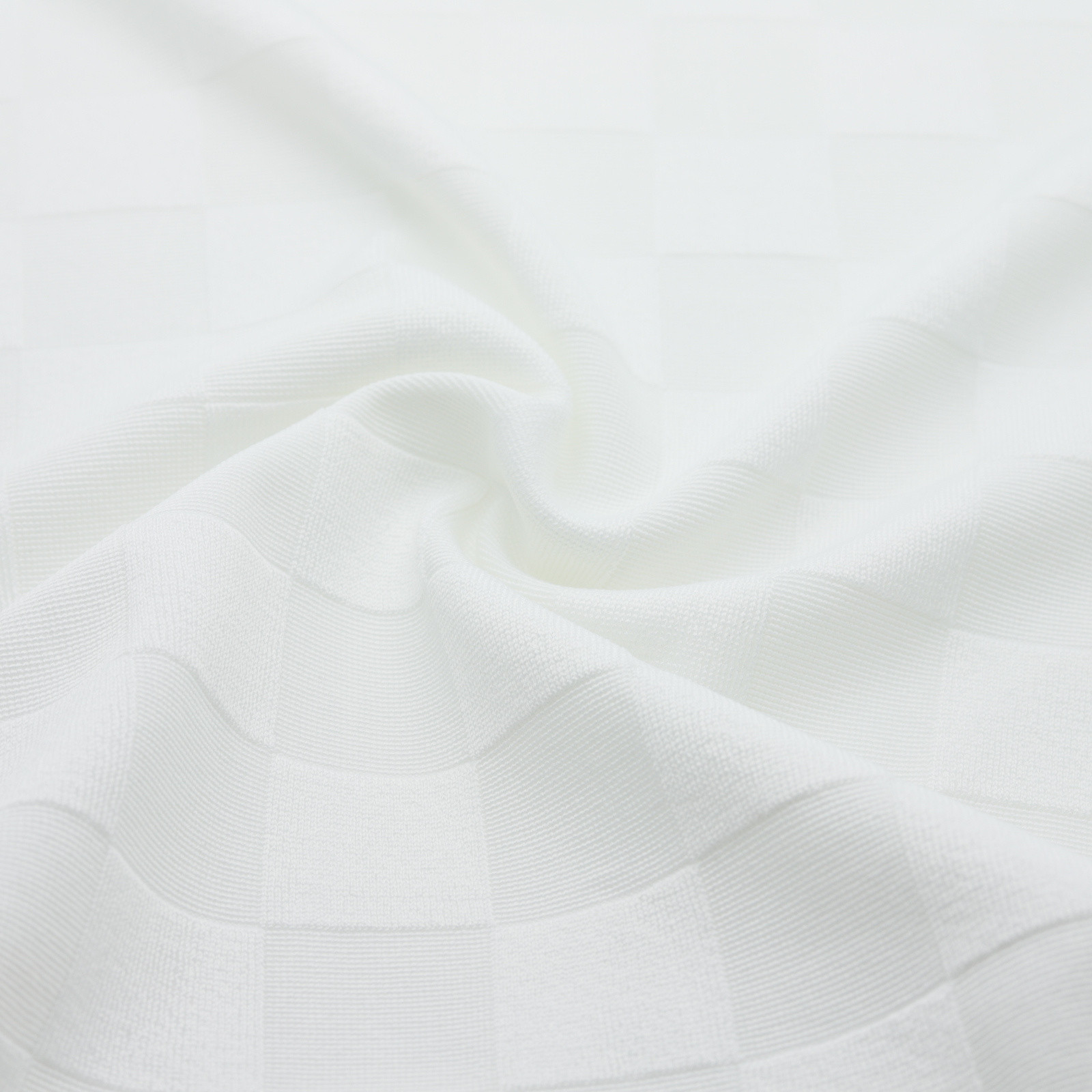 Tissu en jacquard texturé motifs carreaux blanc