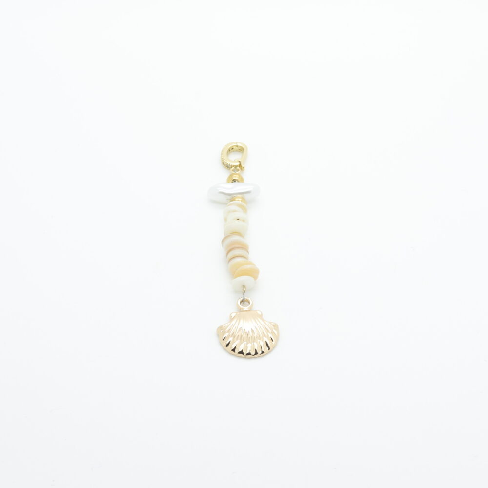 Gioiello da bagno con conchiglia d'oro