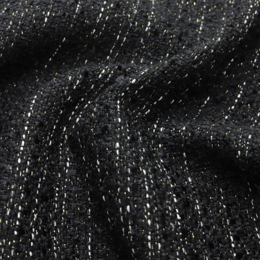 Tissu tweed bouclé noir à fil lurex doré