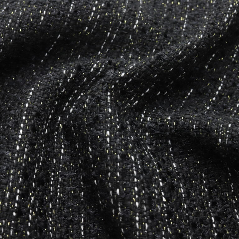 Tissu tweed bouclé noir à fil lurex doré