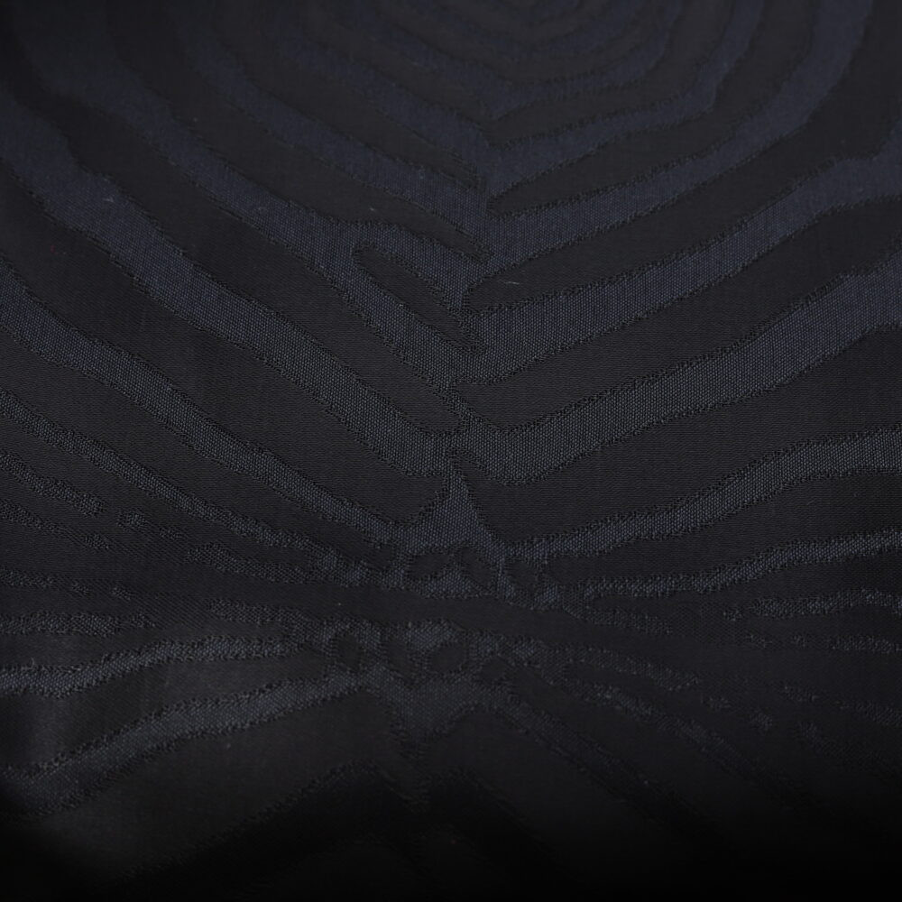 Tissu viscose et coton noir texturé ton sur ton