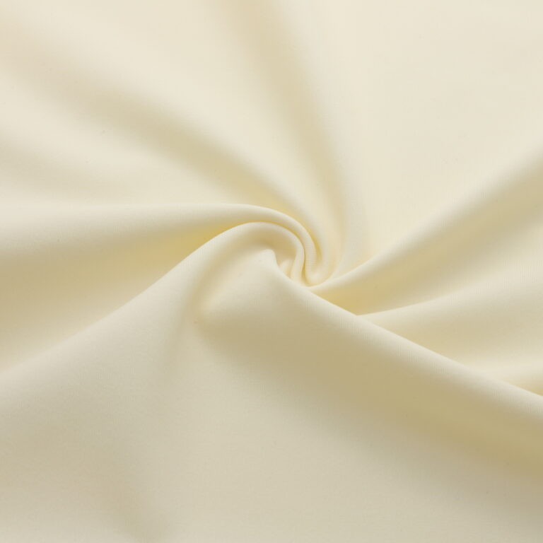 Thick matte ivory Lycra fabric