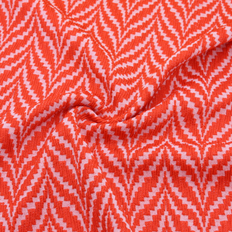 Tissu jacquard chevrons Rouge et rose