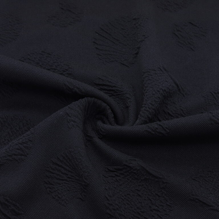 Tissu jacquard coquillages en relief Brun